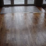 Solid hardwood adds beauty and class to this entryway - custom hardwood flooring by Meistercraft Wood Flooring
