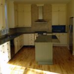 Custom kitchen flooring in solid maple by Meistercraft Wood Flooring