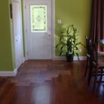 Entrance to this home blends tile and hardwood flooring - by Meistercraft Wood Flooring