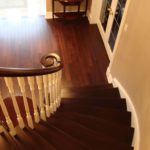 Curved stair and entry floor in custom hardwood by Meistercraft Wood Flooring