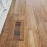 Custom flush air vent in hardwood floor by Meistercraft Wood Flooring